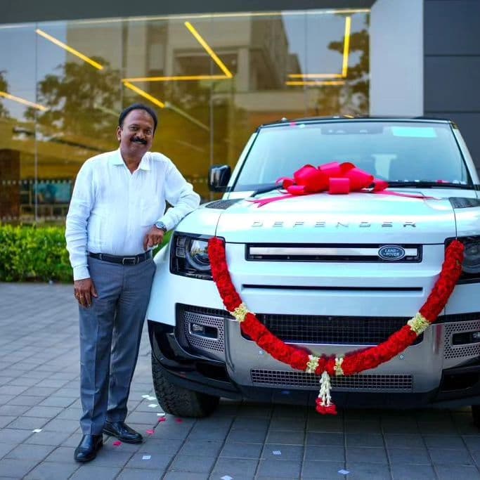 Ramesh Babu G welcoming a new Land Rover Defender to the fleet